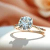 Admire the exquisite design of a 2 carat engagement ring with a brilliant diamond centerpiece.