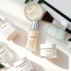 Discover Heimish kaufen with luxurious skincare products beautifully arranged for an elegant touch.