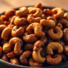 Roasted cashew nuts arranged in a rustic bowl, showcasing their rich color and texture.