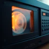 Convert VHS to Digital using a high-quality converter in a softly lit setting.