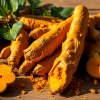 Harvested Turmeric Root displayed on wood exuding natural health benefits and vibrant color.