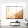 Showcase a large 36x48 frame elegantly displaying artwork in a bright, modern living room.