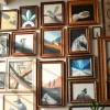 Display large frames artfully arranged in a stylish interior gallery.