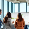 Engaged team of a startup recruitment agency collaborating on innovative hiring strategies.