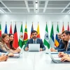 Representatives discussing trade agreements in a modern conference room with diverse flags.