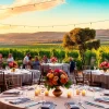 Stunning setup for clarksburg wedding venues with elegant tables among lush vineyards.