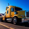 Efficient service from an affordable big rig towing company assisting a stranded truck.