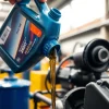 Pouring air compressor oil into machinery, showcasing maintenance importance and quality.