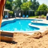 Showcasing pool construction site with workers and modern inground pool being built.