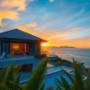 View of luxurious properties in Phuket real estate under a vibrant sunset, showcasing tropical elegance.