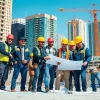 Construction professionals of the southern california contractors association collaborating on site, showcasing teamwork.