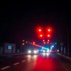 Düzce haber son dakika: Traffic incident scene illuminated by police lights showing urgency and response.