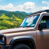 Rent a modern 4x4 vehicle for your car rental in Uganda adventures in a scenic landscape.