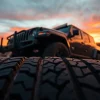 Showcase of General tires highlighting durability against a rugged backdrop at sunset.