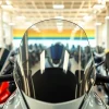 Showcase motorcycle windshields featuring various styles and designs on display.