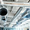 Duct Design florida showcasing an advanced ductwork system in a modern office.
