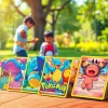 Pokemon tcg india cards illustrated on a table with children trading in a sunny park.