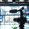 Engaging live stream setup showcasing modern equipment and digital displays in a bright studio