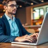 Apply for uk eta online application at a café with a laptop and warm ambience.