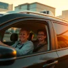 Airport taxi transfer Halifax with delighted passengers enjoying a comfortable ride downtown.