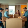 Best Toronto movers teamwork efficiently in a modern apartment setting.